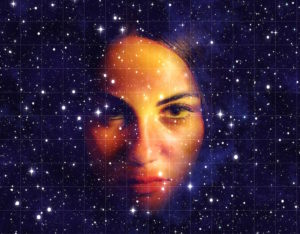 face imposed over a field of stars