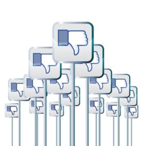 Vector illustration of facebook dislike buttons on poles voicing negative opinions or campaign, like Your Page has been unpublished.