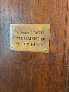Wall plaque indicating Victor Hugo's apartment.