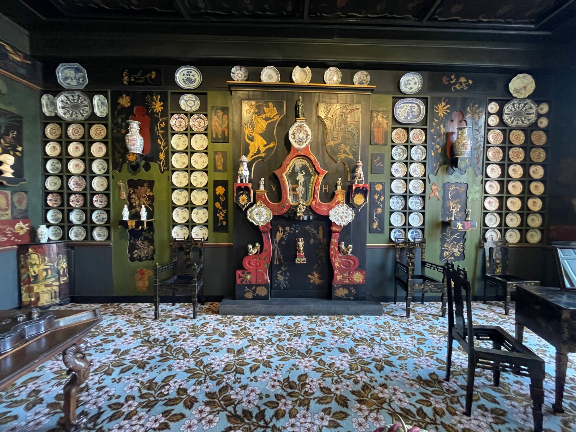 A wall display of Victor Hugo's China and serving plates.