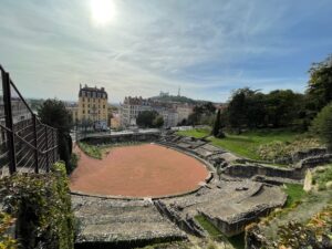 Lugdunum's amphitheatre and in the distance you can see Fourvière where the previous ruins are located.